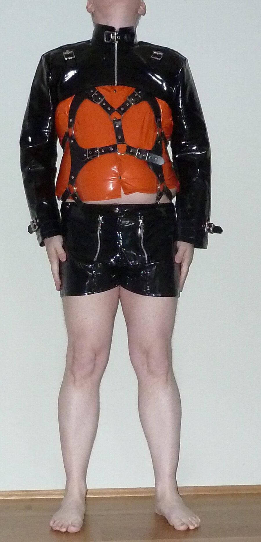 Orange and black fetish gear