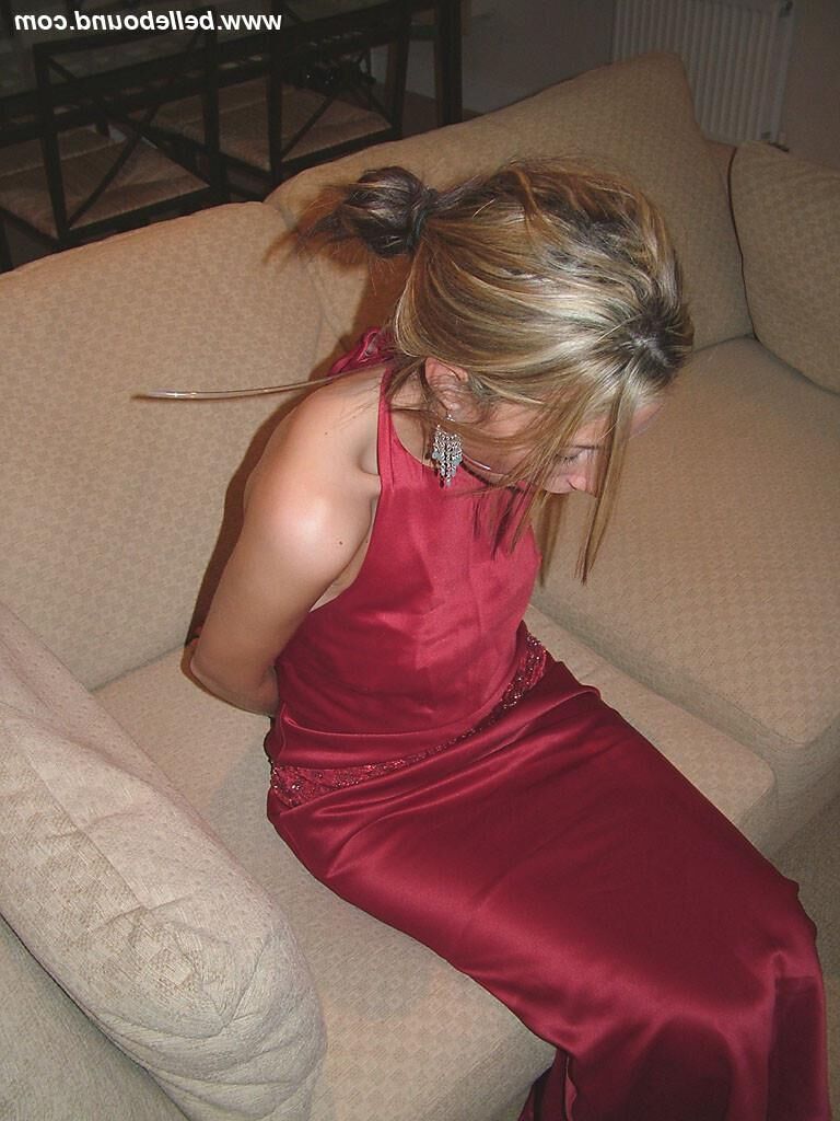 Chrissy Bound in Maroon Dress