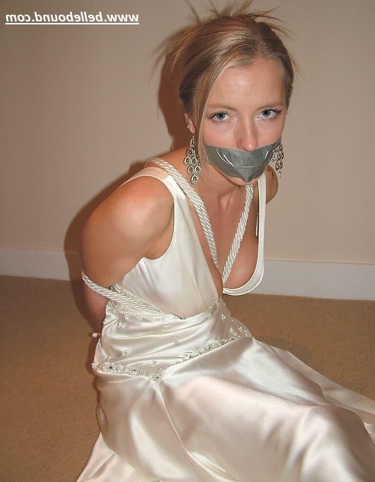 Charlie Dee bound in White Satin Dress