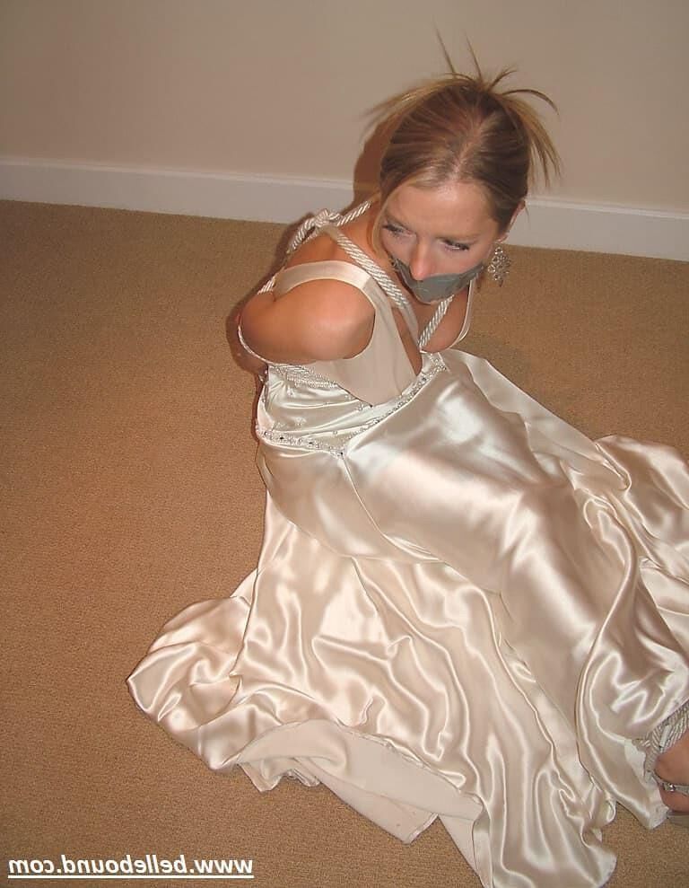 Charlie Dee bound in White Satin Dress