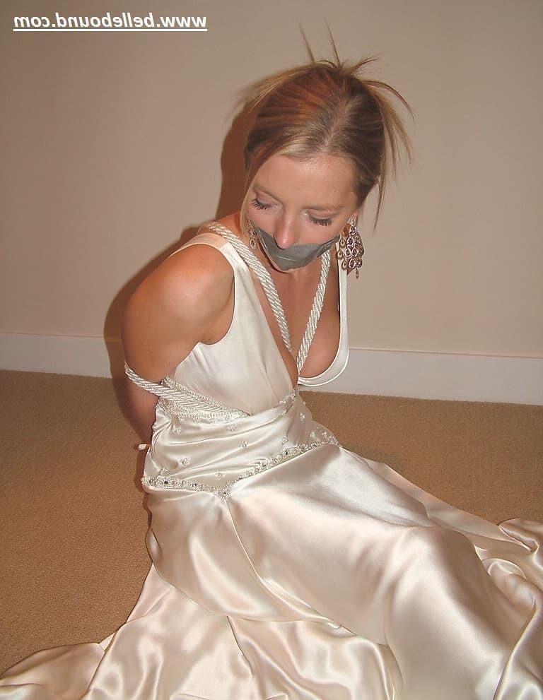 Charlie Dee bound in White Satin Dress