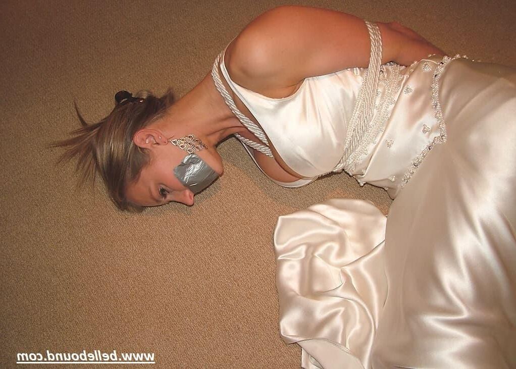 Charlie Dee bound in White Satin Dress