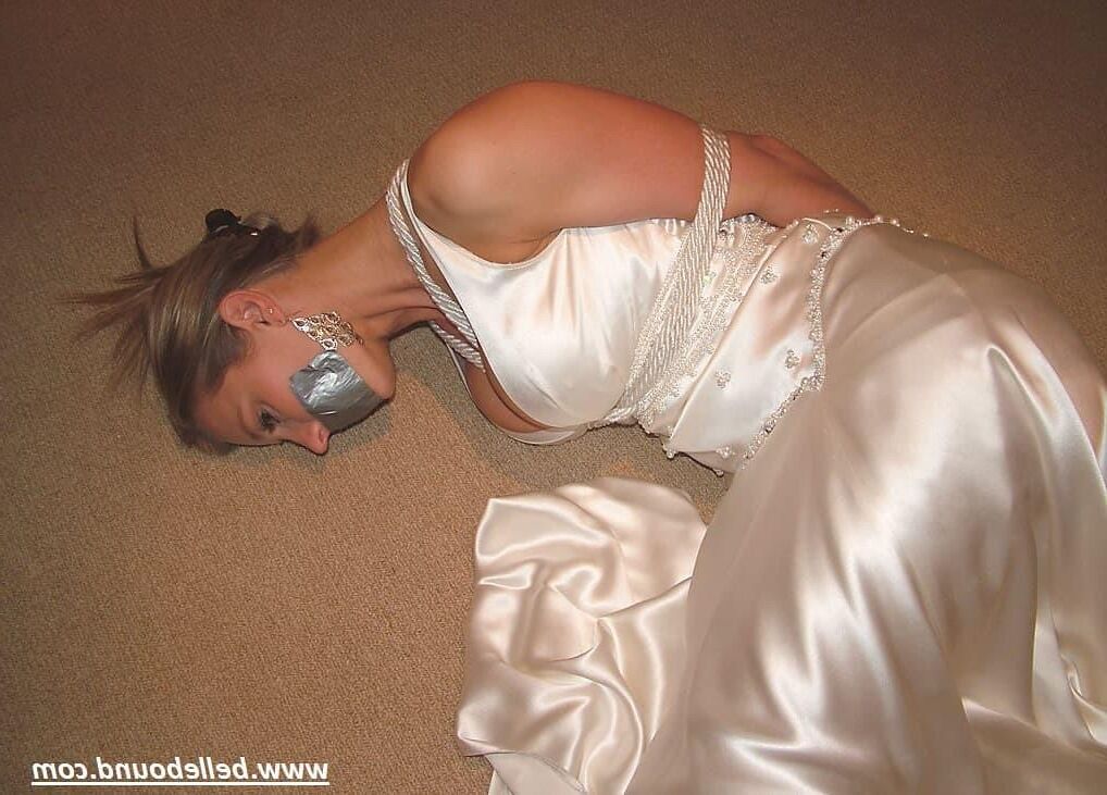 Charlie Dee bound in White Satin Dress