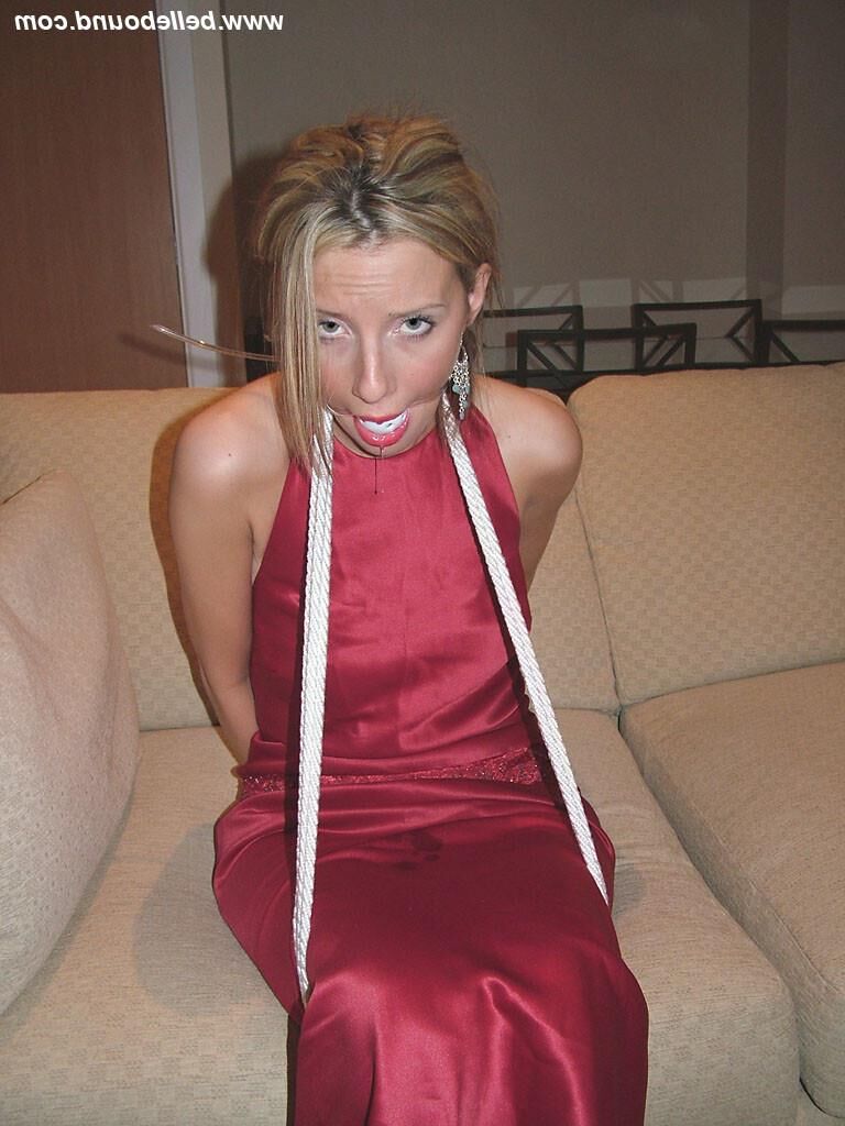 Chrissy Bound in Maroon Dress