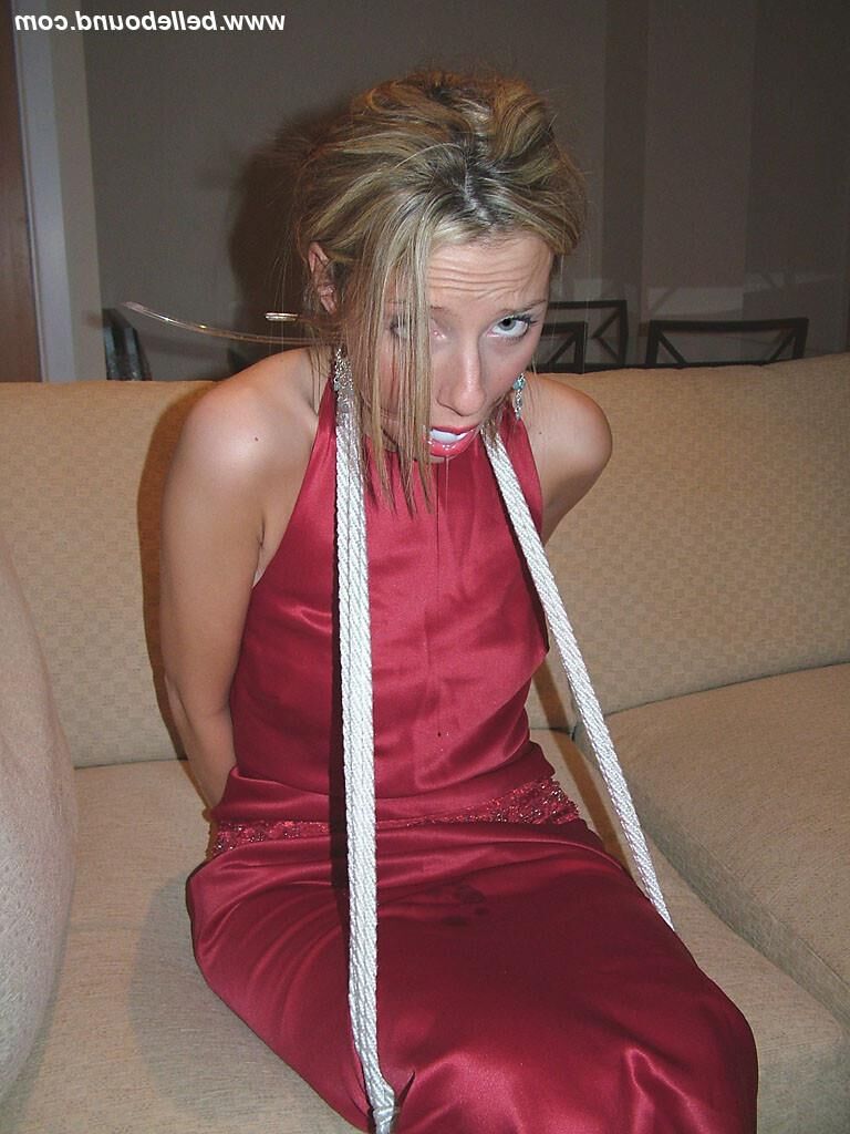 Chrissy Bound in Maroon Dress