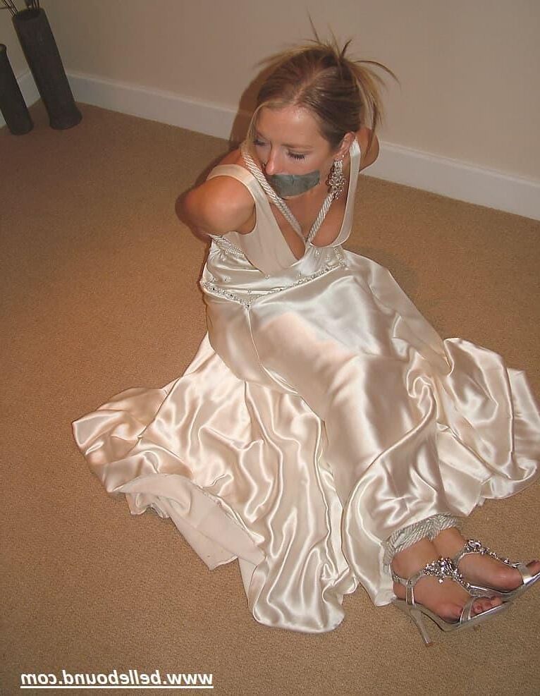 Charlie Dee bound in White Satin Dress
