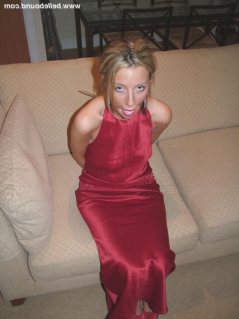 Chrissy Bound in Maroon Dress