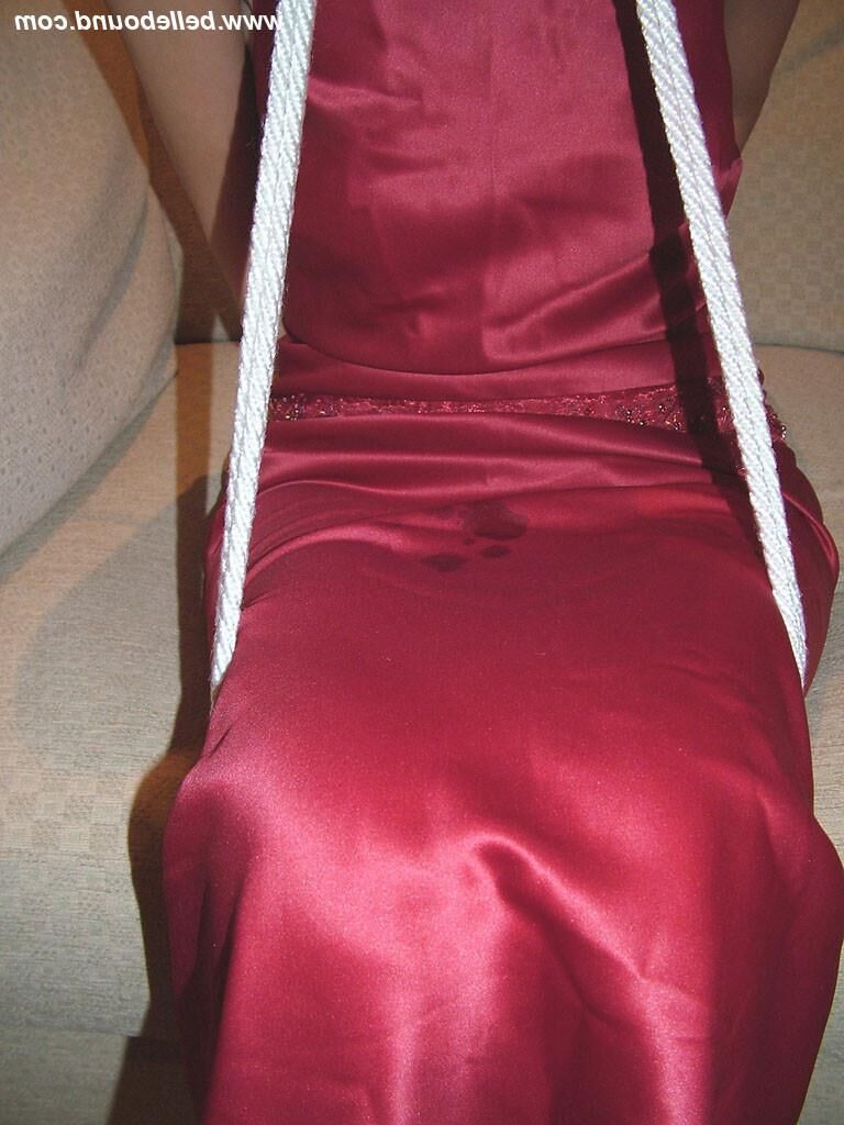 Chrissy Bound in Maroon Dress