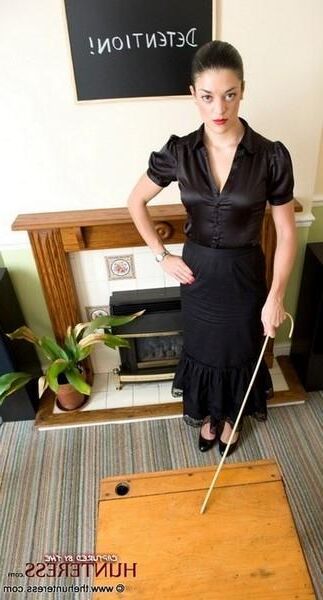Maîtresse Femdom avec de la canne