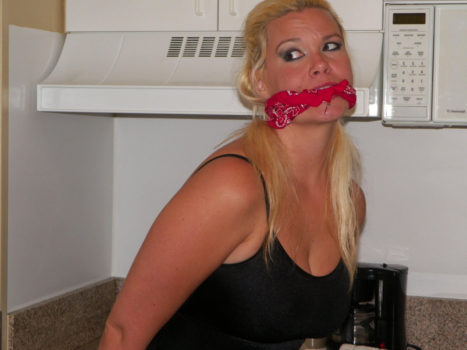 HOT BLONDE GAGGED AND TIED UP