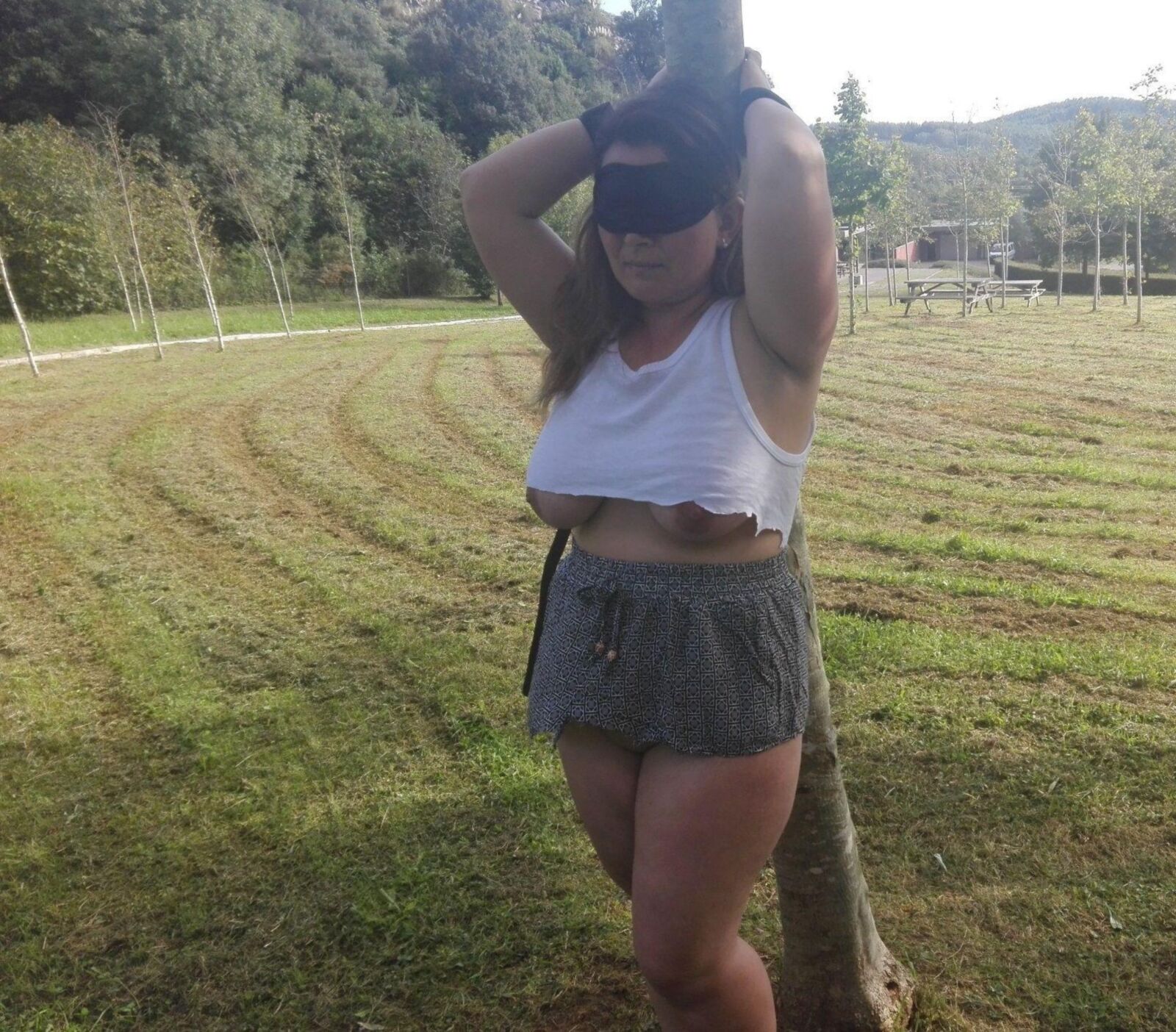 Sluts blindfolded and hooded outdoors